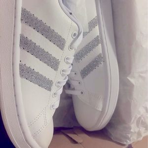 STUNNING NEVER WORN, WHITE ADIDAS SNEAKERS, ENCRUSTED WITH SWAROVSKI CRYSTALS.